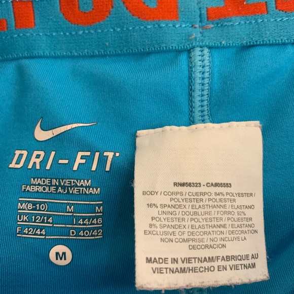 NIKE Dri-fit shorts. Red with blue built in spandex. Size M. - Picture 6 of 6